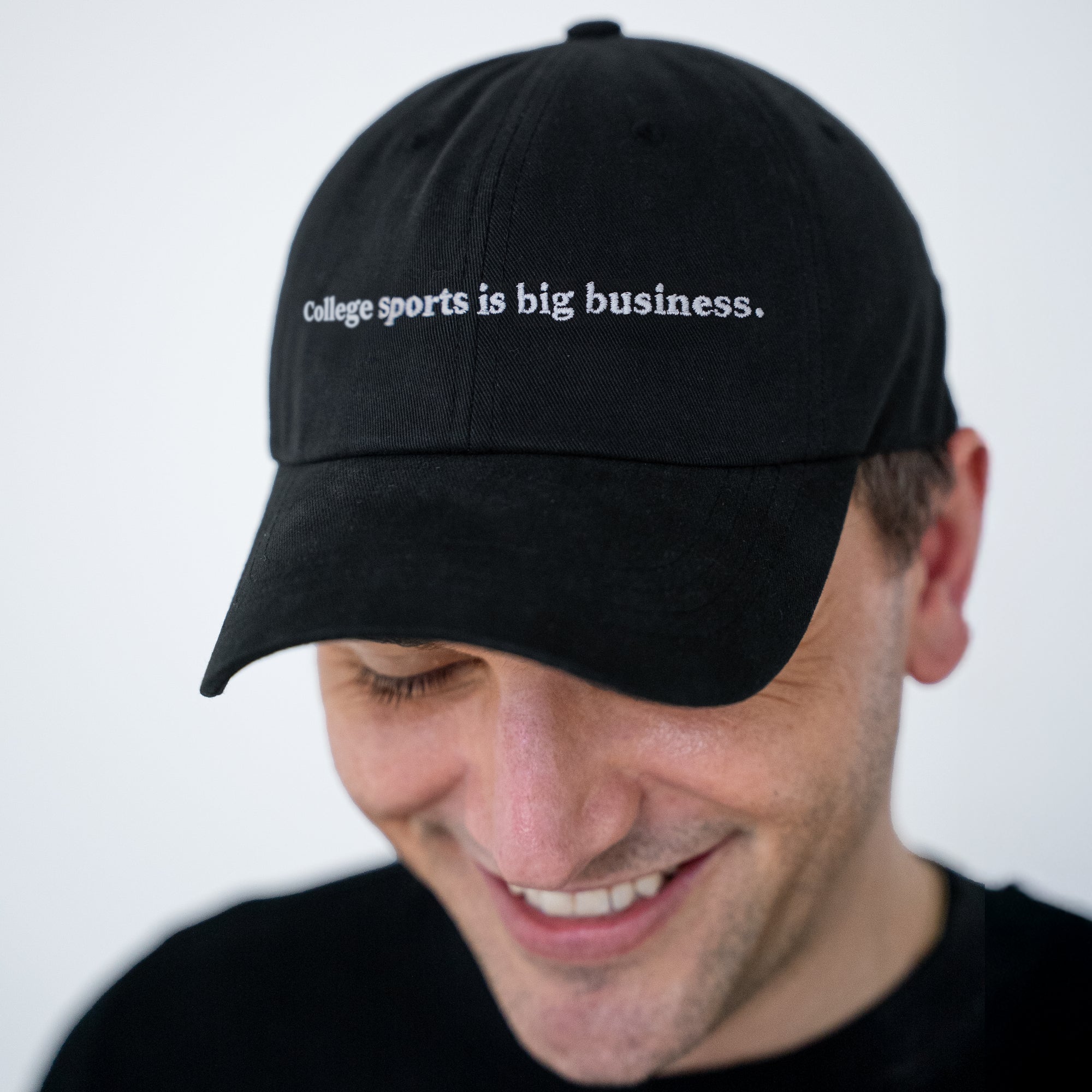 College sports is big business. Hat
